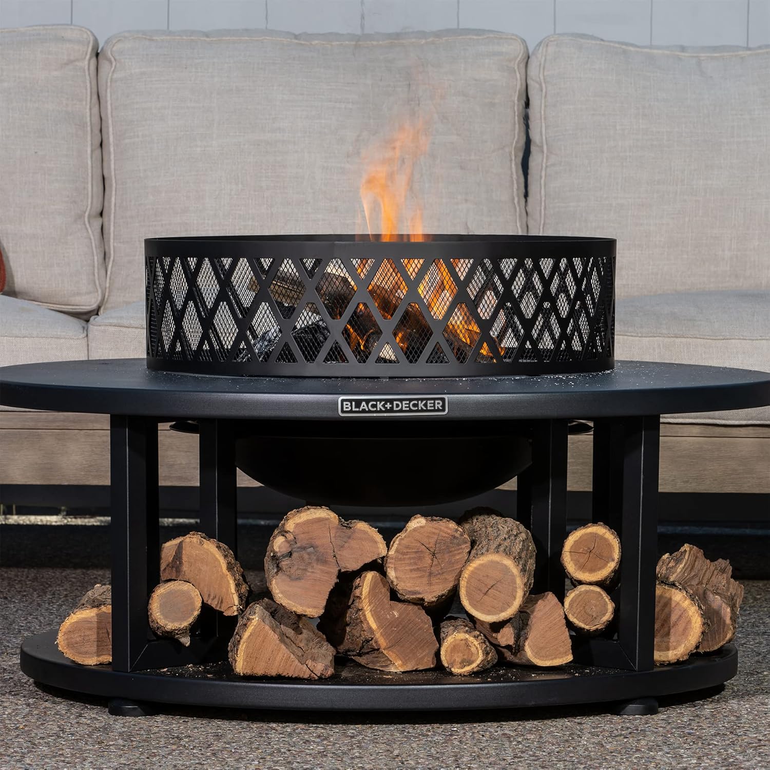BLACK + DECKER 38" D Steel Wood burning fire pit with log storage area for entertaining backyard bonfires includes mesh lid and poker Black powder coated steel