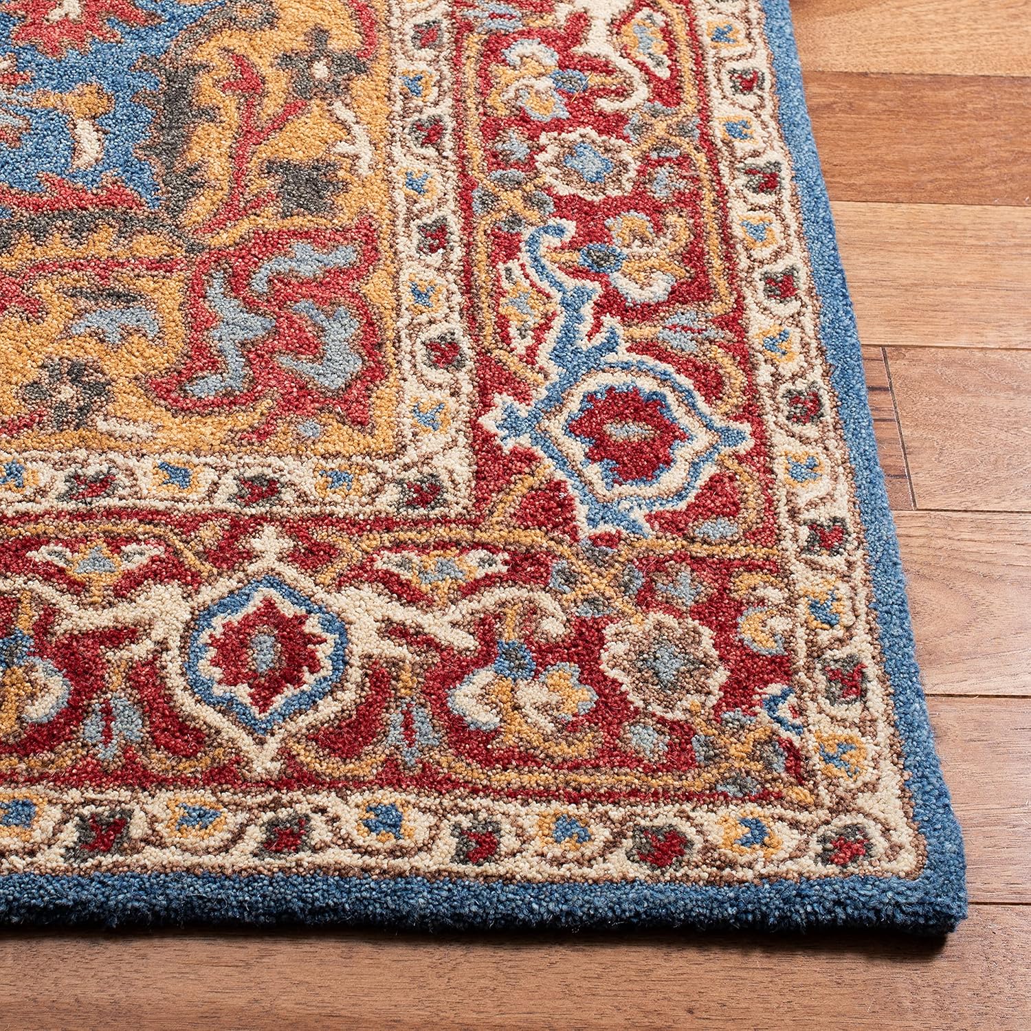 SAFAVIEH Antiquity Collection Area Rug - 8' x 10', Red & Blue, Handmade Traditional Oriental Wool, Ideal for High Traffic Areas in Living Room, Bedroom (AT521Q)