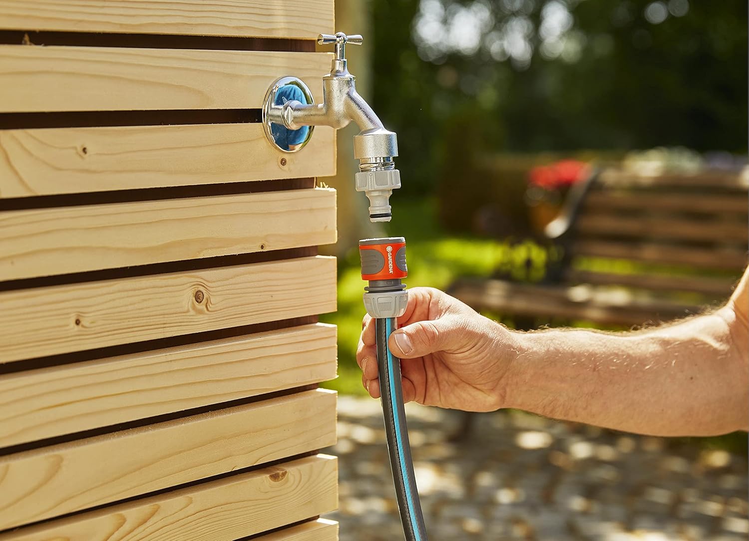 Gardena Wall Mounted Retractable hose reel. 65 Ft with Automatic Rewind, 180 Degree Swivel Bracket and any Length hose Lock. Made in Europe