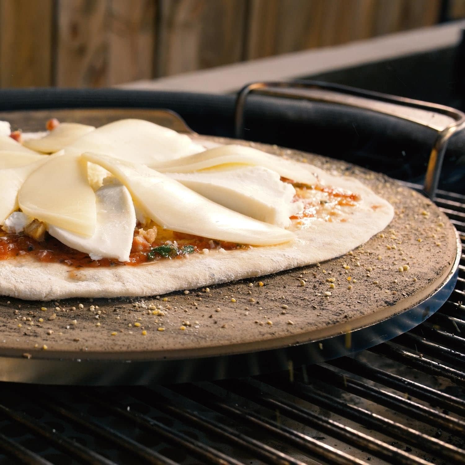 BBQGUYS Signature Ceramic Pizza Stone with Stainless Steel Carry Rack - BBQ-KPZ-16