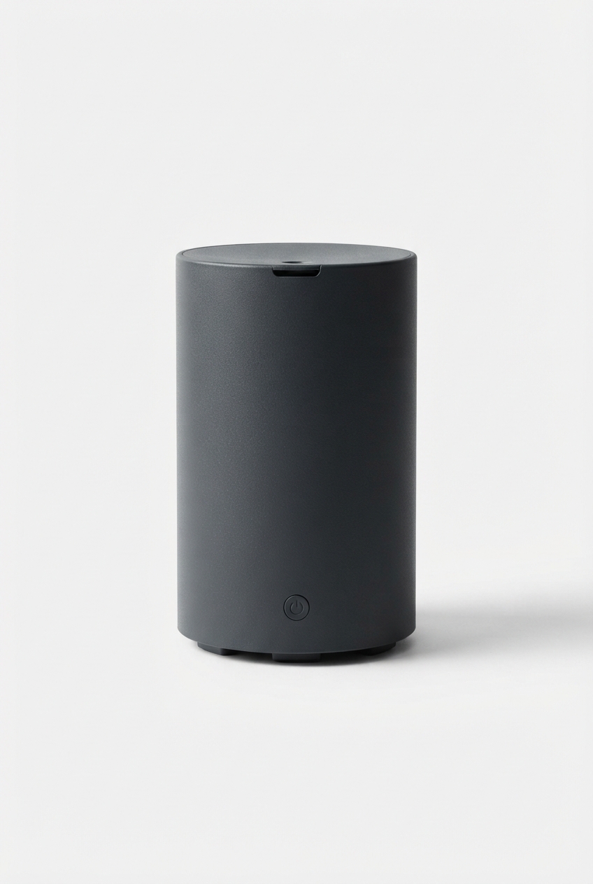 Dark-styled home scent diffuser on seamless background
