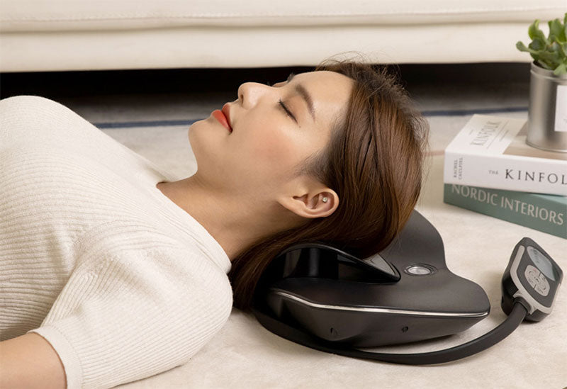 A state-of-the-art cervical traction device designed for neck pain relief and spine alignment. The Hypertrax features an ergonomic design with adjustable headrests, padded neck supports, and a digital control panel for customized settings. It is shown in use, with a person lying on a comfortable surface, the device gently stretching their neck to alleviate pain and improve posture.