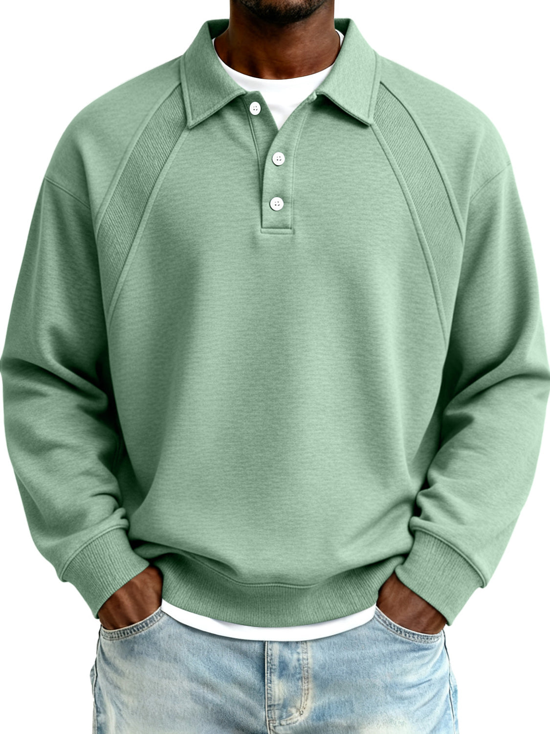 Person wearing a green pullover with a collar on a white background