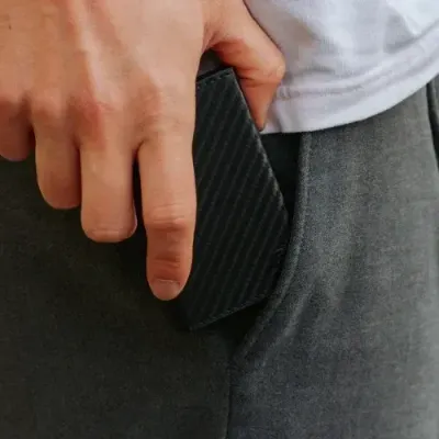 Smart wallet in pants pocket
