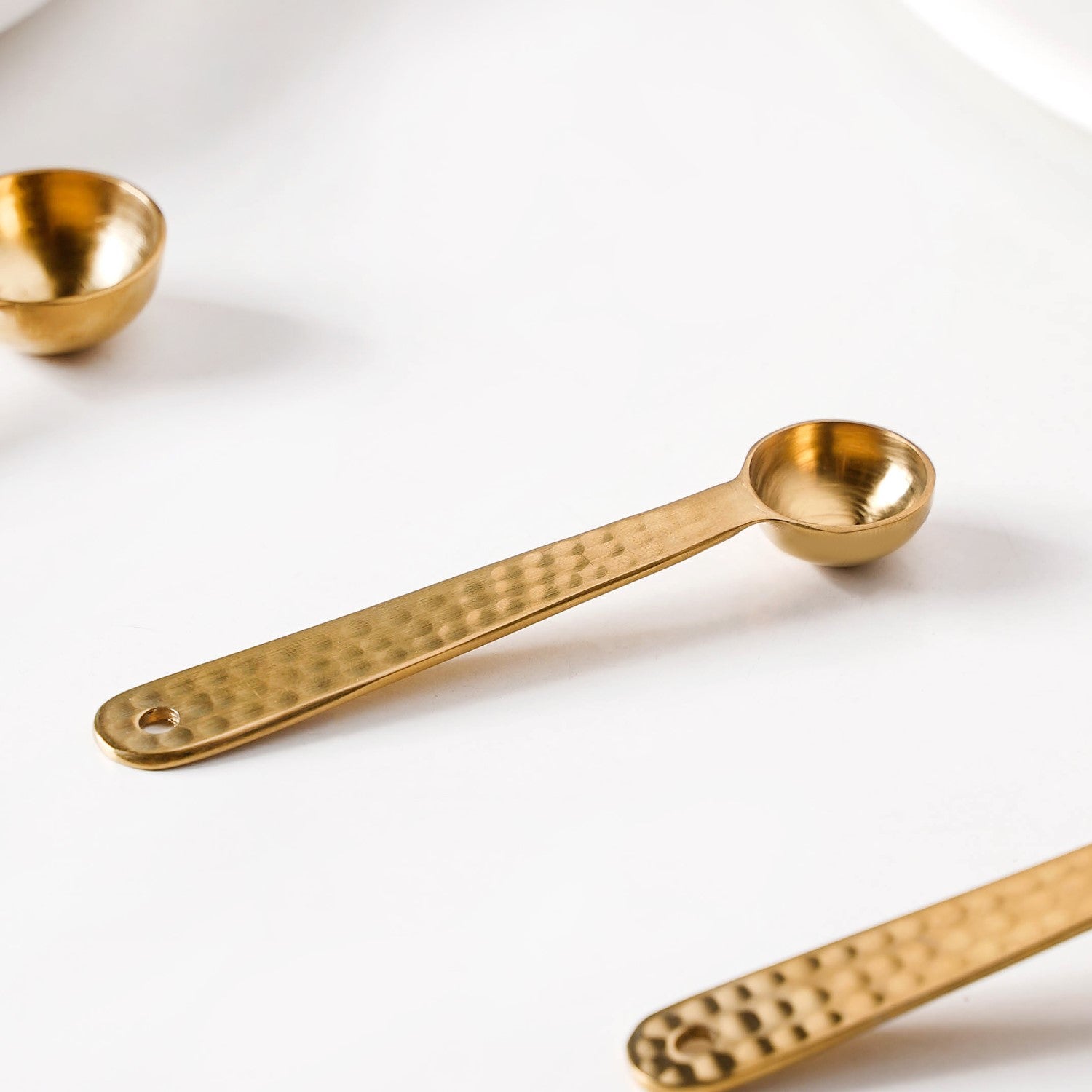 Set Of 4 Gold Measuring Spoons