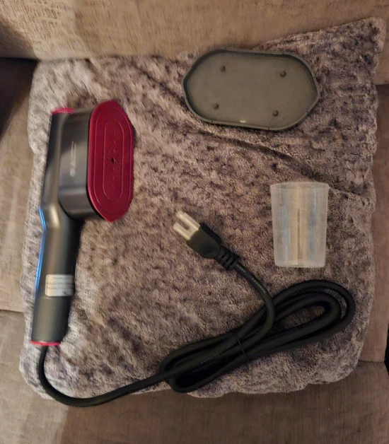 Customer holding Klyro Steam Pro close to camera