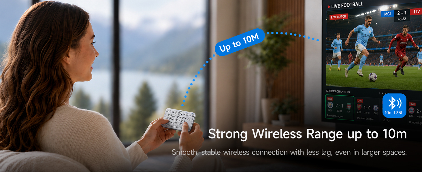 Woman using mini Bluetooth keyboard to control smart TV within 10 meters