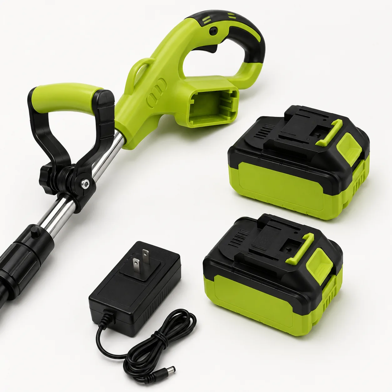 Two unbranded removable battery packs and a charger beside the tool handle