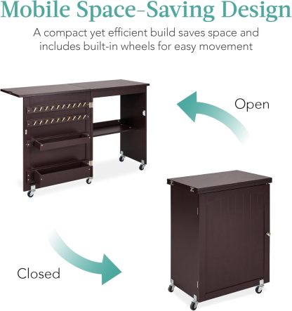 Best Choice Products - Mesa de coser plegable multiusos, estación de manualidades, diseño compacto, ruedas, estantes, almacenamiento, clavijas, puertas magnéticas, pomos de puerta de metal, blanca
