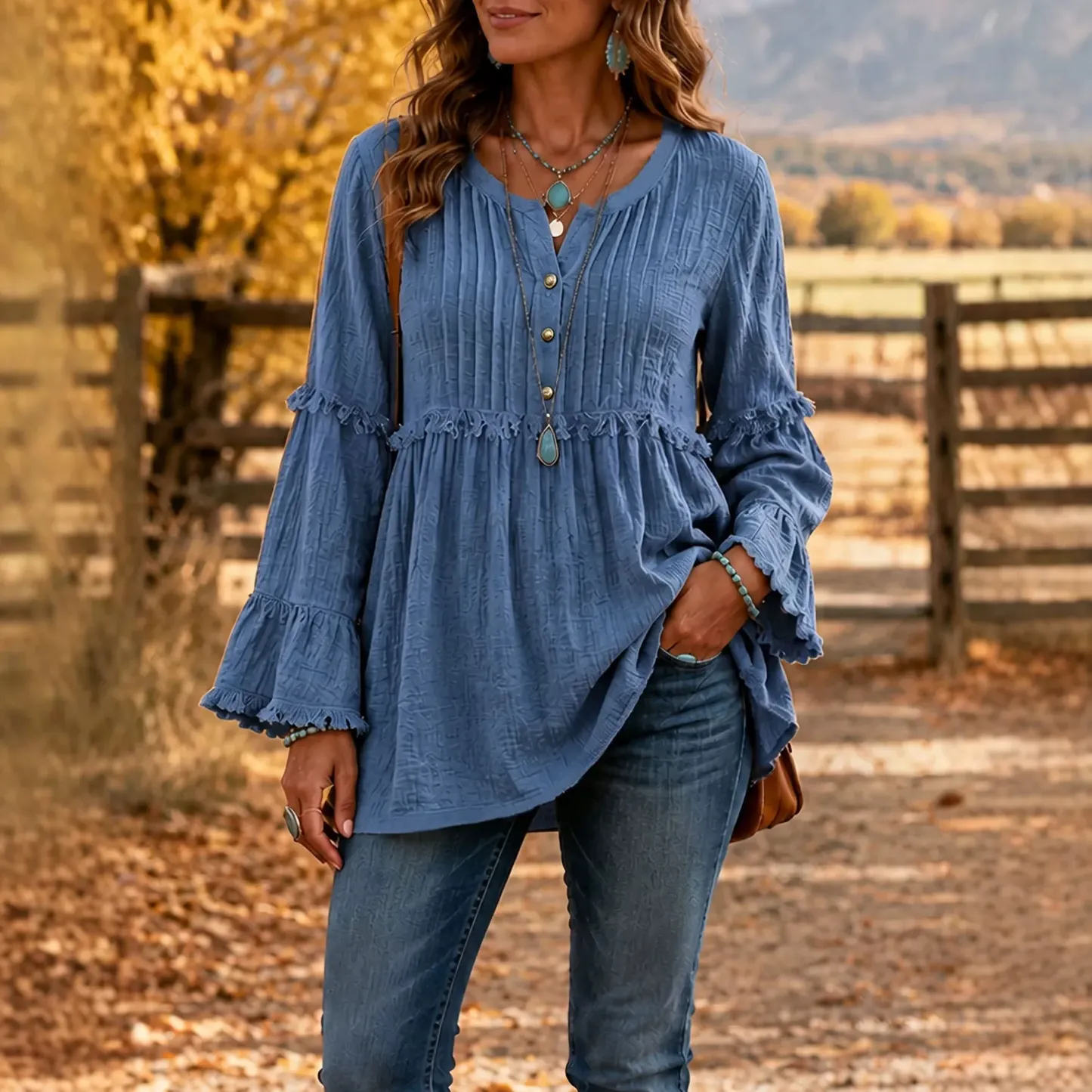 Bohemian women's blouse with ruffles, long bell sleeves, buttoned henley collar, V-neck, flowy casual tunic with peplum