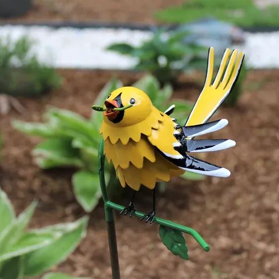 Goldfinch, Cardinal, Western Bluebird, Ruby-throated Hummingbird on a garden stake
