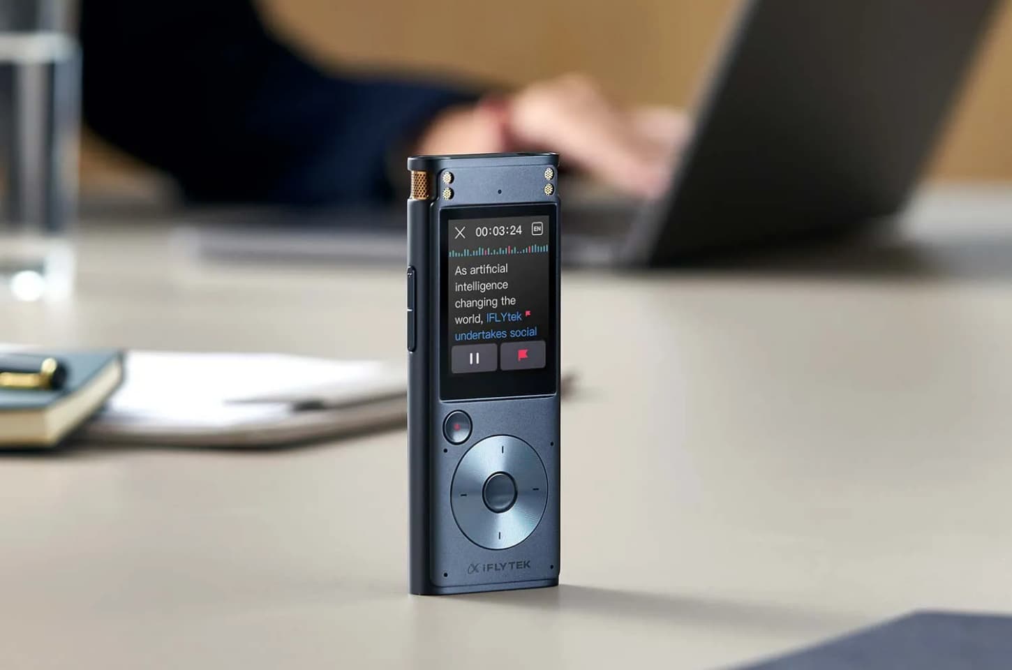 iFLYTEK AI recorder on desk
