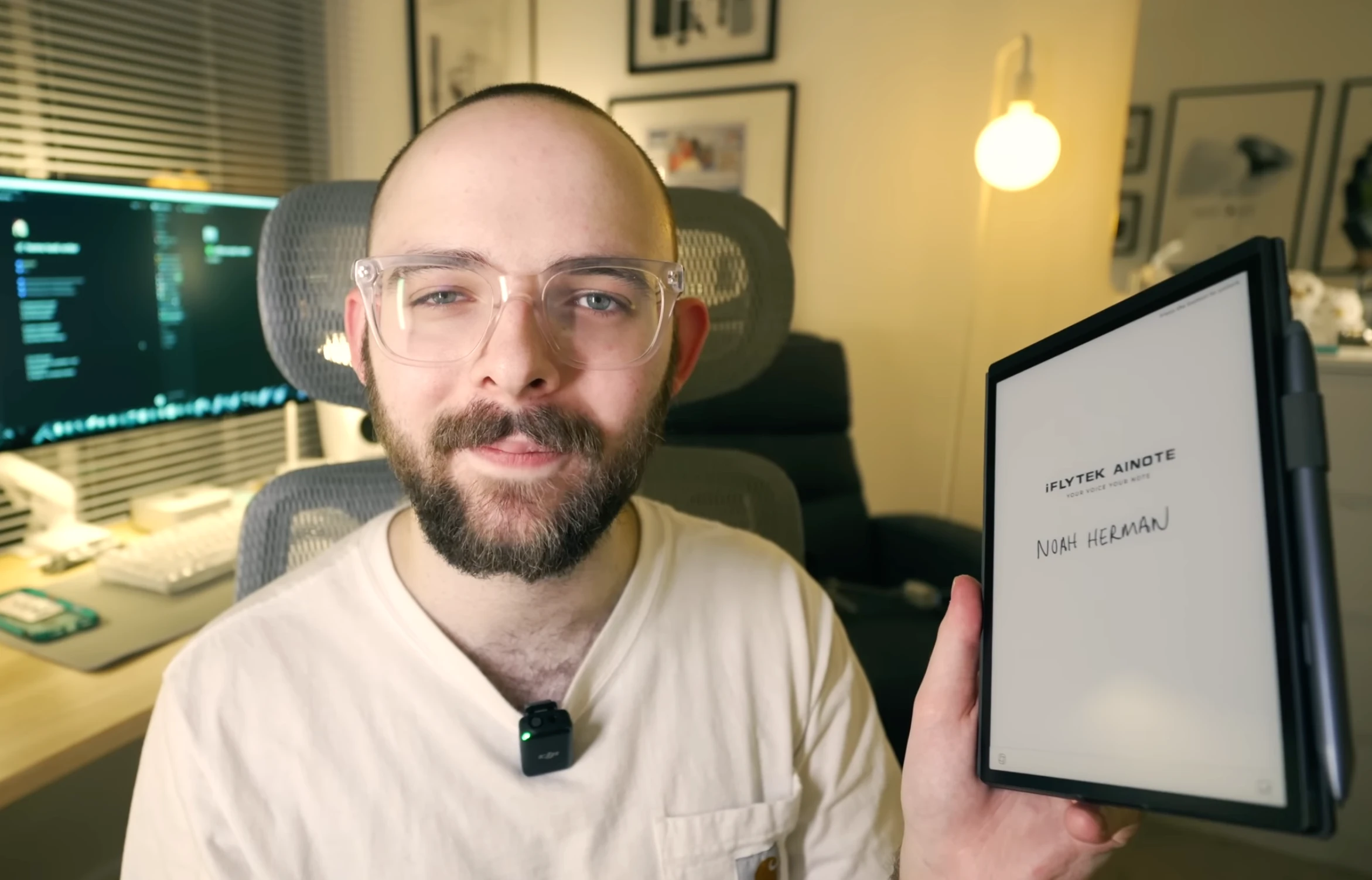 Person holding iFLYTEK AINOTE tablet device

