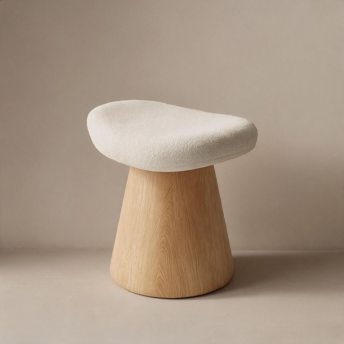 Cream Upholstered Swivel Vanity Stool with Wood-Grain Base and Crescent Seat