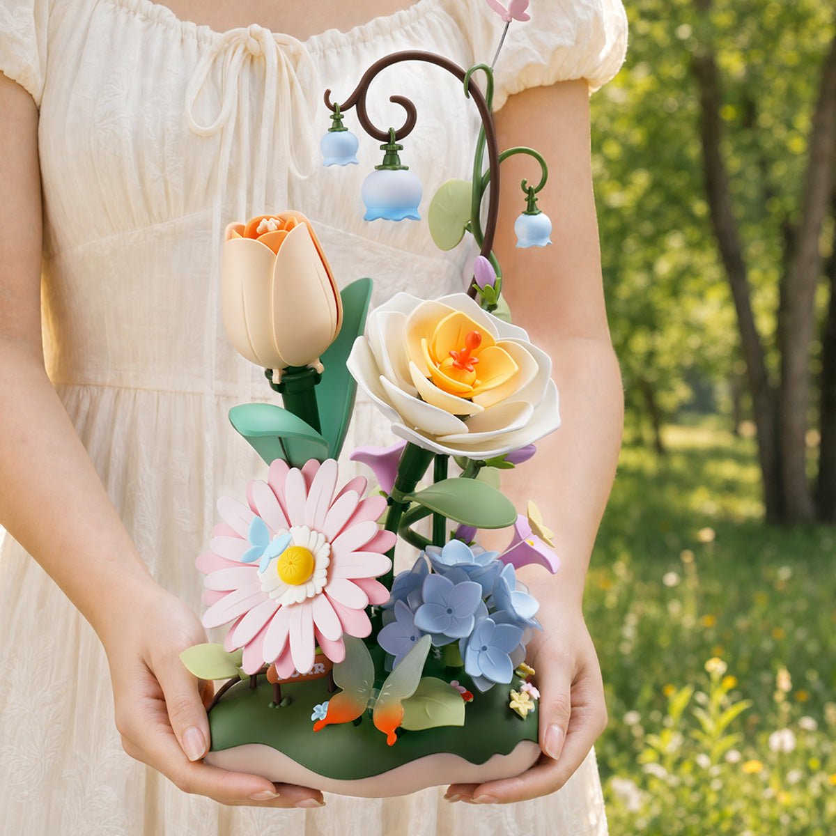 Bewegliche Schmetterlinge und Blüten des ROKR Garden Ramble AF02D