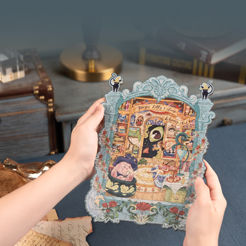 Ilustración del puzzle sostenida antes de enmarcarla — TA009