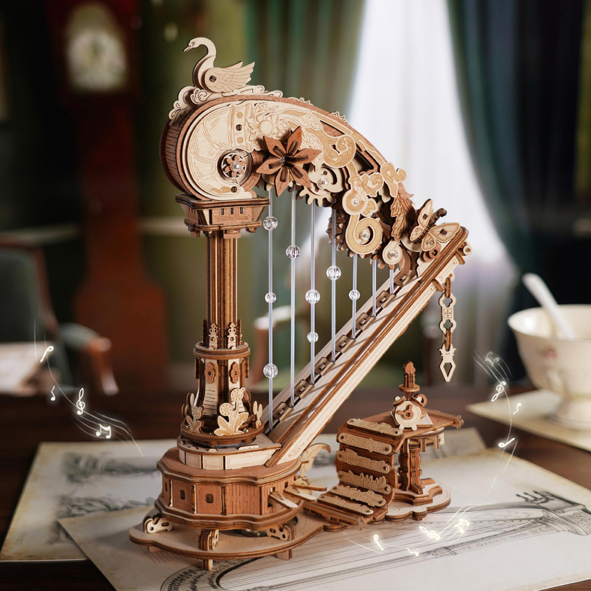 Arpa musical montada sobre un libro abierto — AMK71