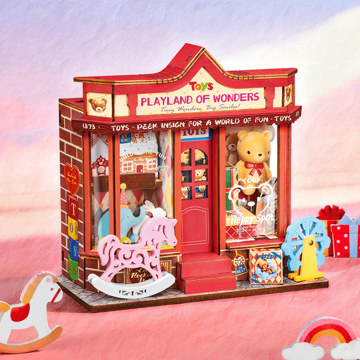 Rolife Whimsy Toy Shop DS044 magasin de jouets miniature dans une scène d'affichage rose de style