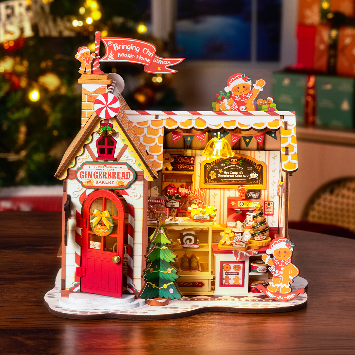 Gingerbread House DG176 leuchtende Bäckerei-Ausstellung in einer festlichen Tischszene