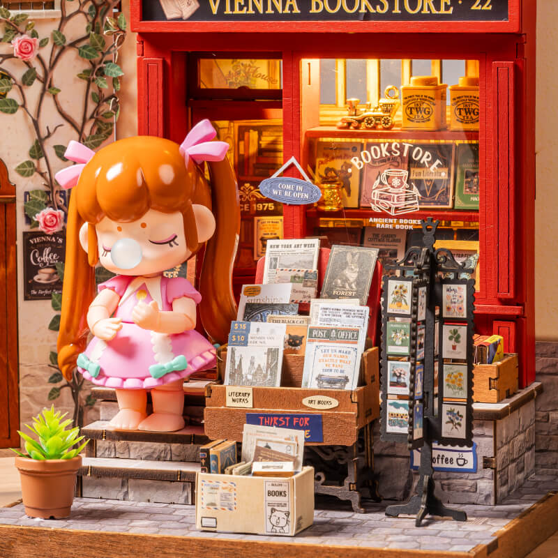 Wiener Buchhandlung DG183 Nahaufnahme des Schaufensters, Bücher und Figurendetails