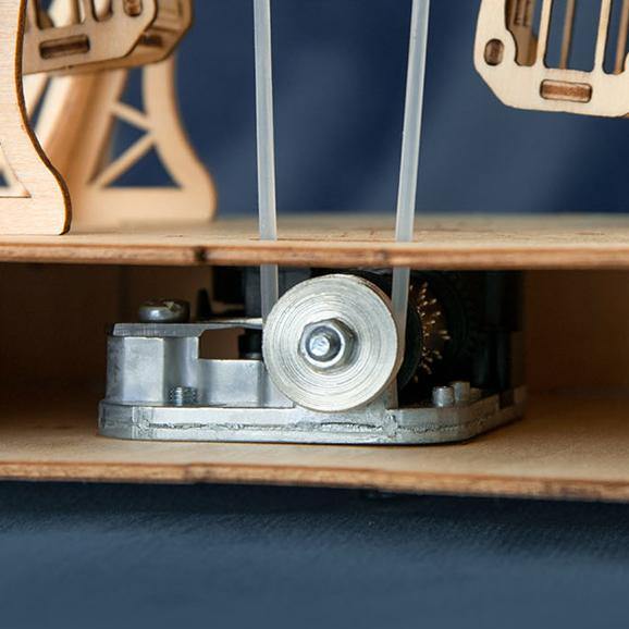 Rolife Moderne Muziekdoos - Gaint 3D Houten Puzzel - Reuzenrad TGN01 wielbasis detail close-up
