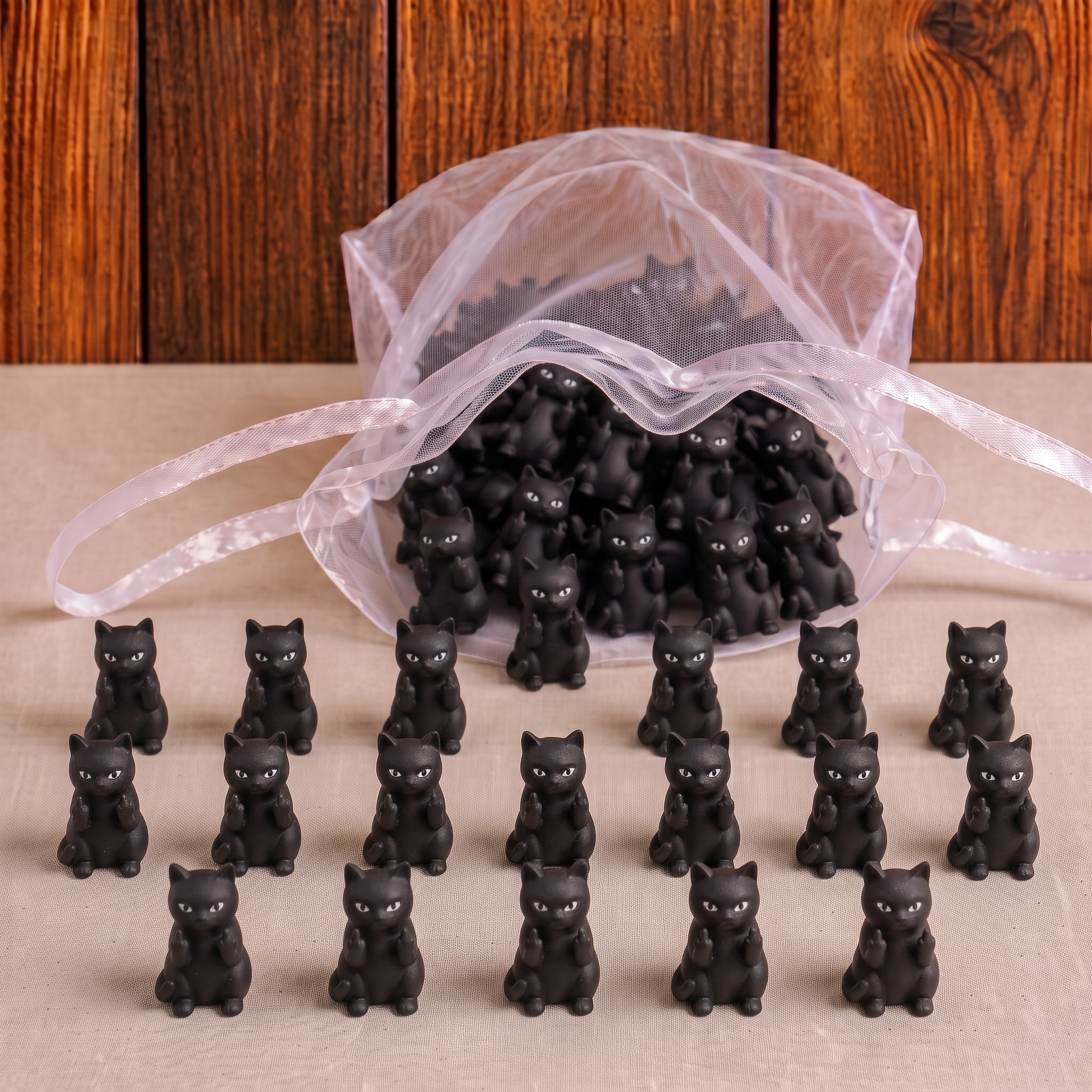 Miniature playful black cat giving the middle finger figurine