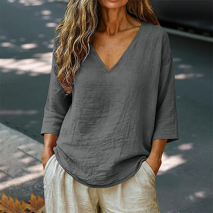Rhianna - Blusa elegante con scollo a V