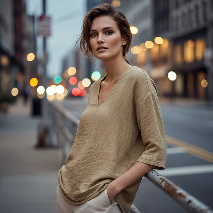 Rhianna - Blusa elegante con scollo a V
