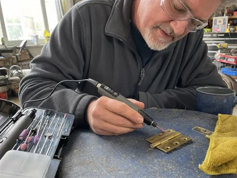 Home workshop project polishing a brass hinge