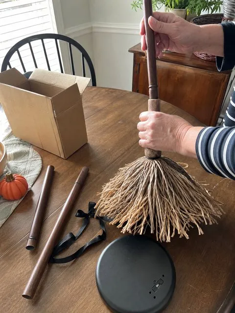 Animated witch broom parts being assembled