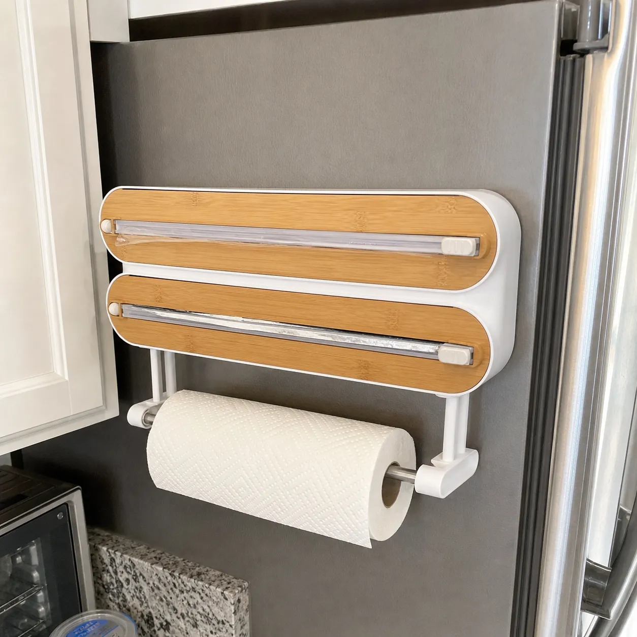 Customer-style photo of dispenser on a refrigerator