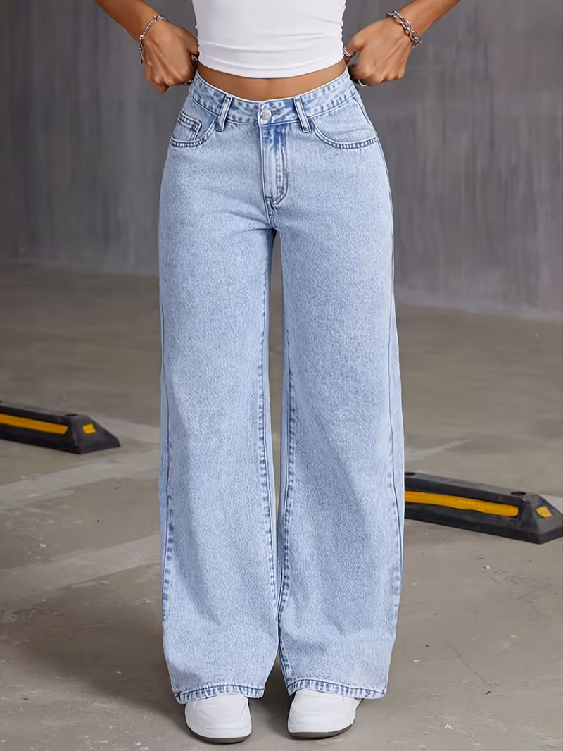 Introducing Fashionable Straight-Leg Jeans for Women That Offer a Relaxed And Comfortable Wide-Leg Design; These Light Blue Acid-Washed Jeans Come with Pockets And Are Perfect for Elegant Occasions; Featuring a High-Waisted, Form-Fitting Style