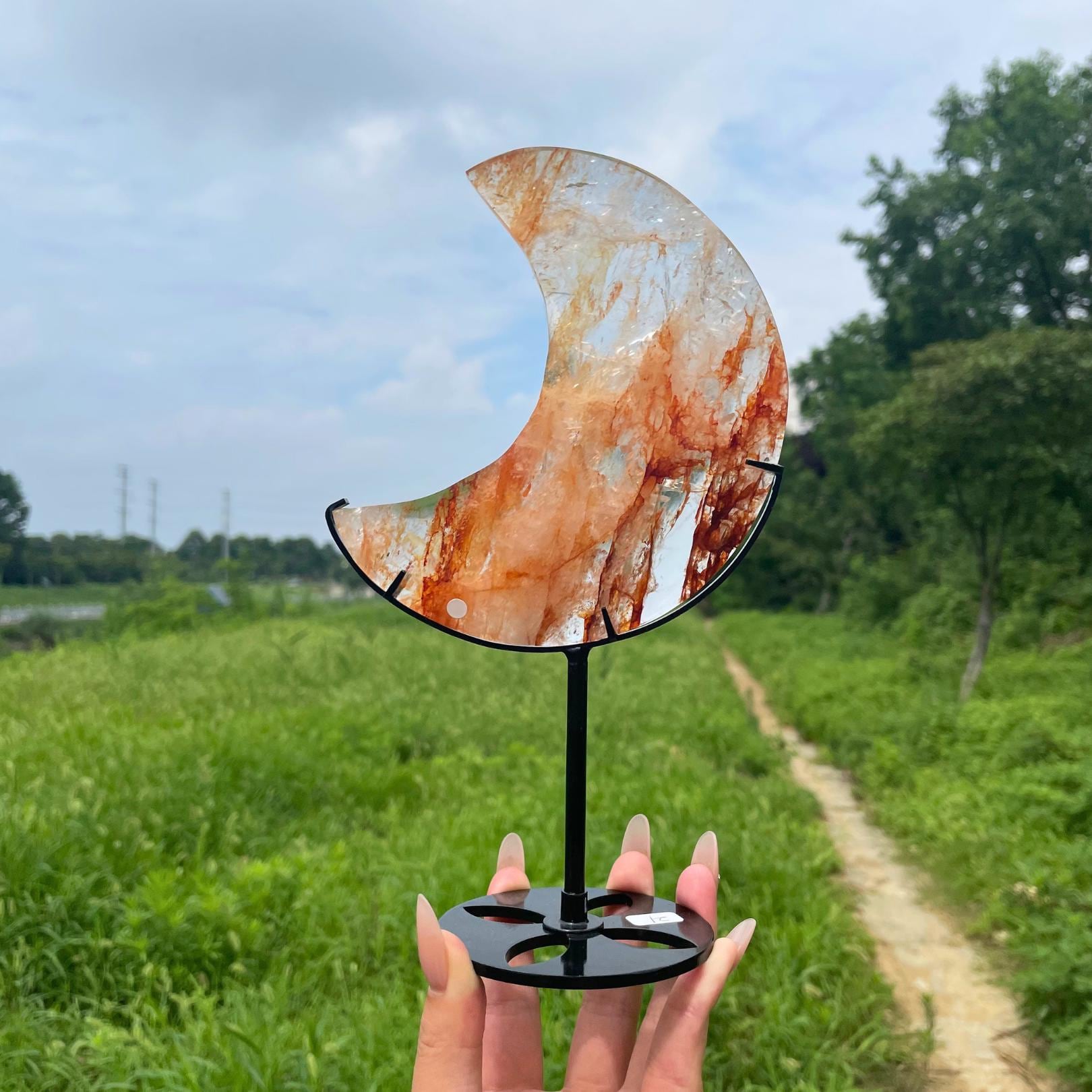 Fire Quartz Crescent Moon on Metal Stand