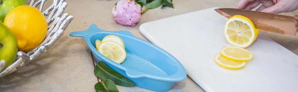 white marble cutting board dip bowl copper knife cambridge fruit bowl basket blue fish lemon apple