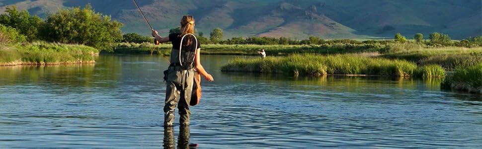 Woman fly fishing