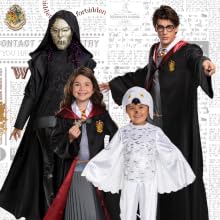 Family in Harry Potter costumes Hedwig Death Eater