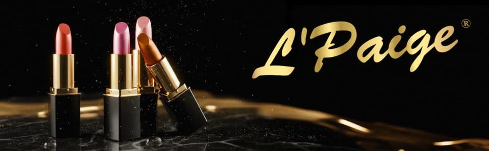 L’Paige Designer Lipsticks on black marble with gold accents and luxury black background.
