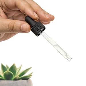 dropper and hand