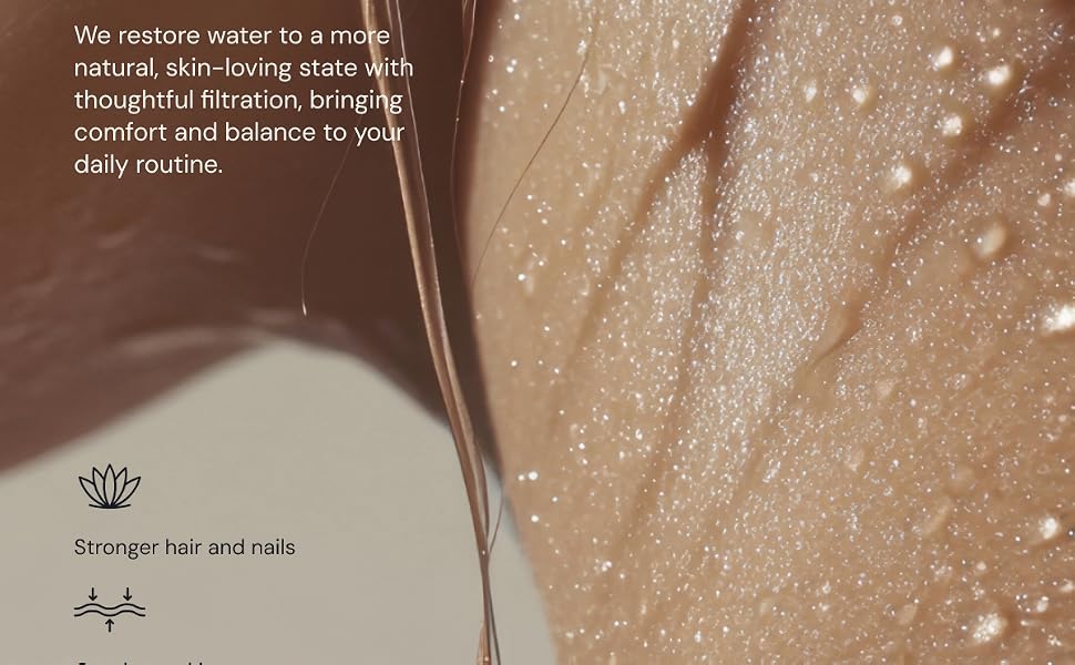Water droplets on skin with strands of wet hair, from a daily shower filter routine