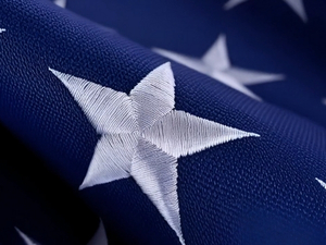 Embroidered stars close-up on American flag made in USA.