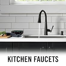image of a kitchen faucet with water on