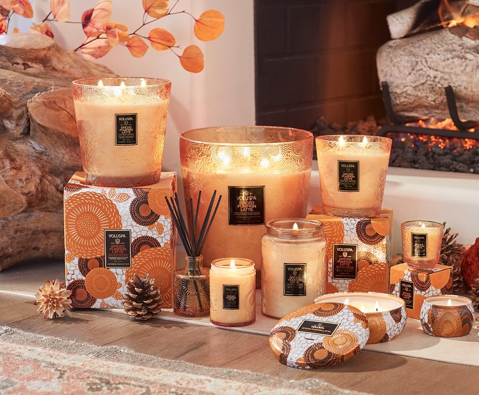 Spiced Pumpkin Latte Collection in front of fireplace