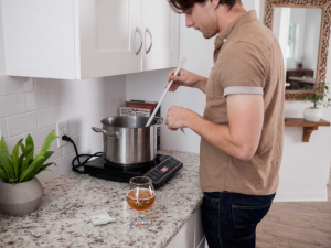 1 Adult Man Brewing Beer