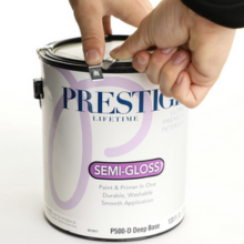 step 2 in removing metal clips from paint can