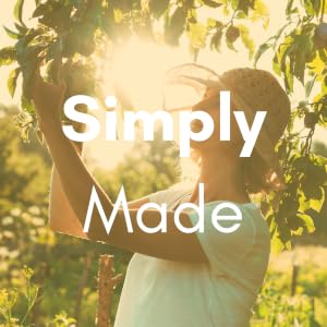 lady picking fruit from tree