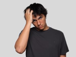 work your fingers into your hair to style for volume or wavy hair