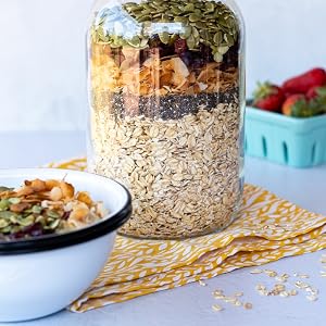 oats in glass jar with fruit and seeds