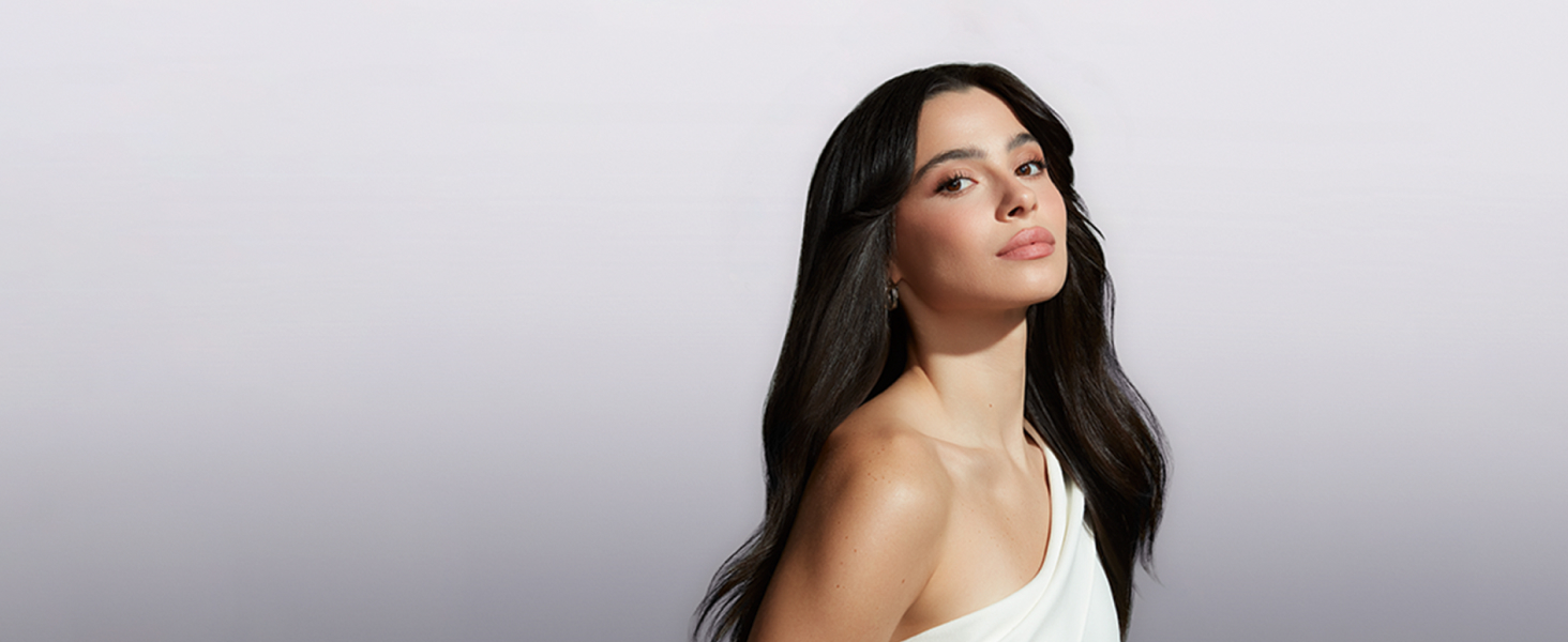 Woman with health-looking shiny black hair.