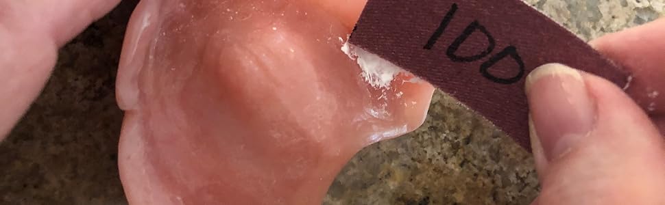 sanding denture sore spot away