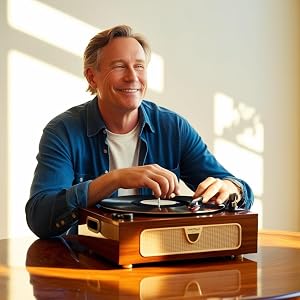 A person enjoying listening to vinyl record player